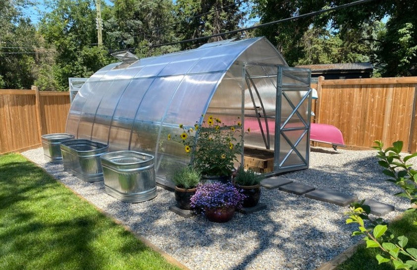 How to Design a Backyard Greenhouse that Complements Your Home